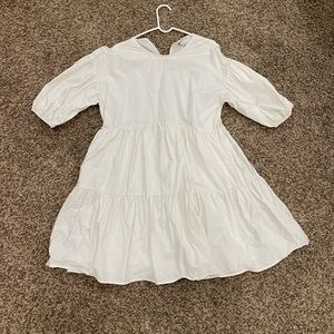 Whitish/light cream colored baby doll dress. Perfect for summer. Light weight.